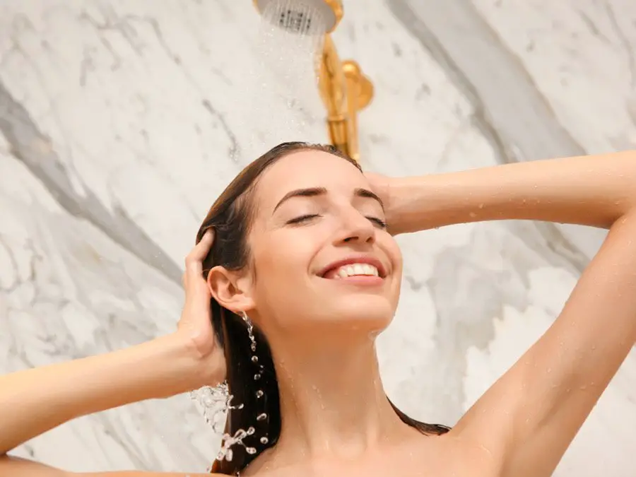Photo of a woman enjoying shower