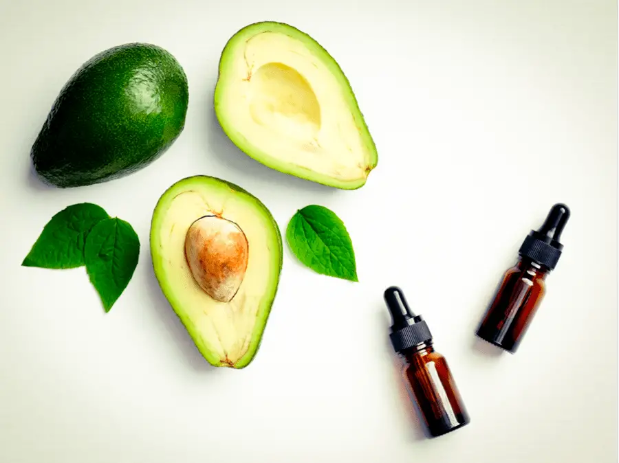 Photo of avocado oil and avocados