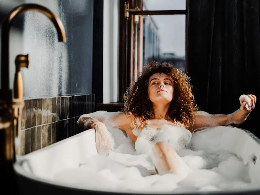 Photo of a woman taking a bubble bath
